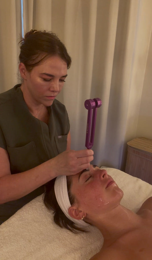 Frequency Facial treatment with weighted tuning forks at Victorious Skincare